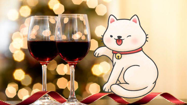Gato y vino durante las vacaciones